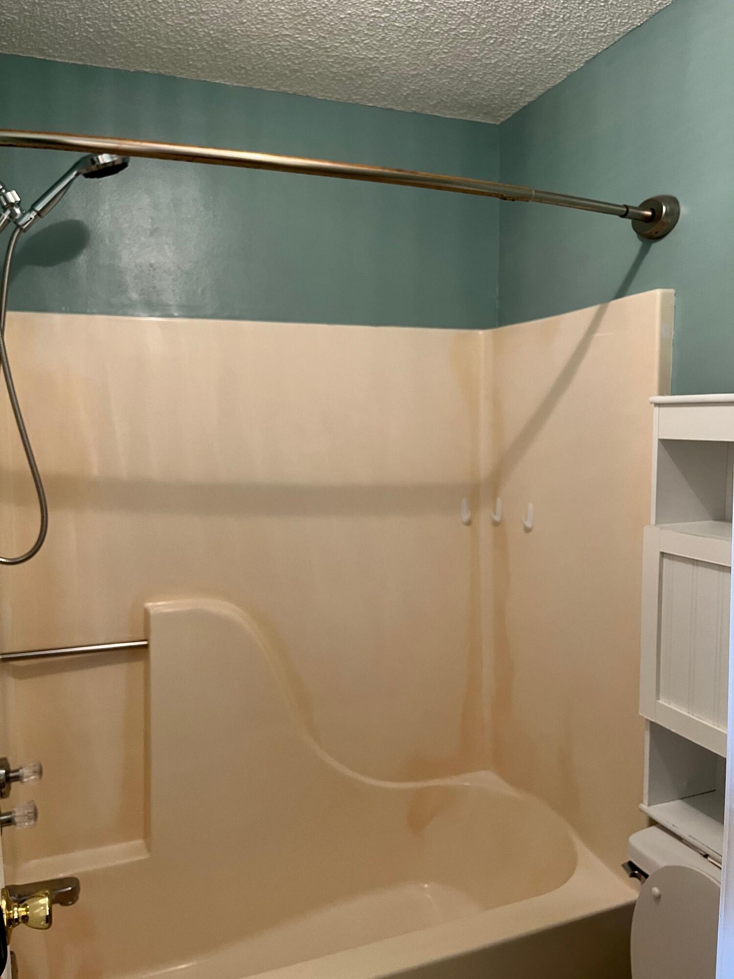 2260 Estate Circle Navarre, FL 32566 - Photo 11 of 14 a bathroom with a shower and a toilet