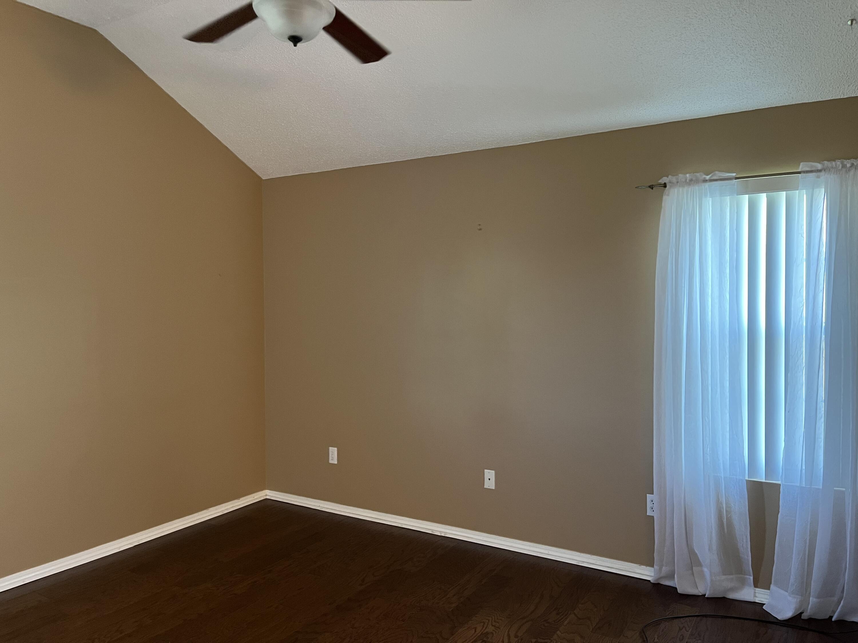 2260 Estate Circle Navarre, FL 32566 - Photo 12 of 14 an empty room with a empty space and a window
