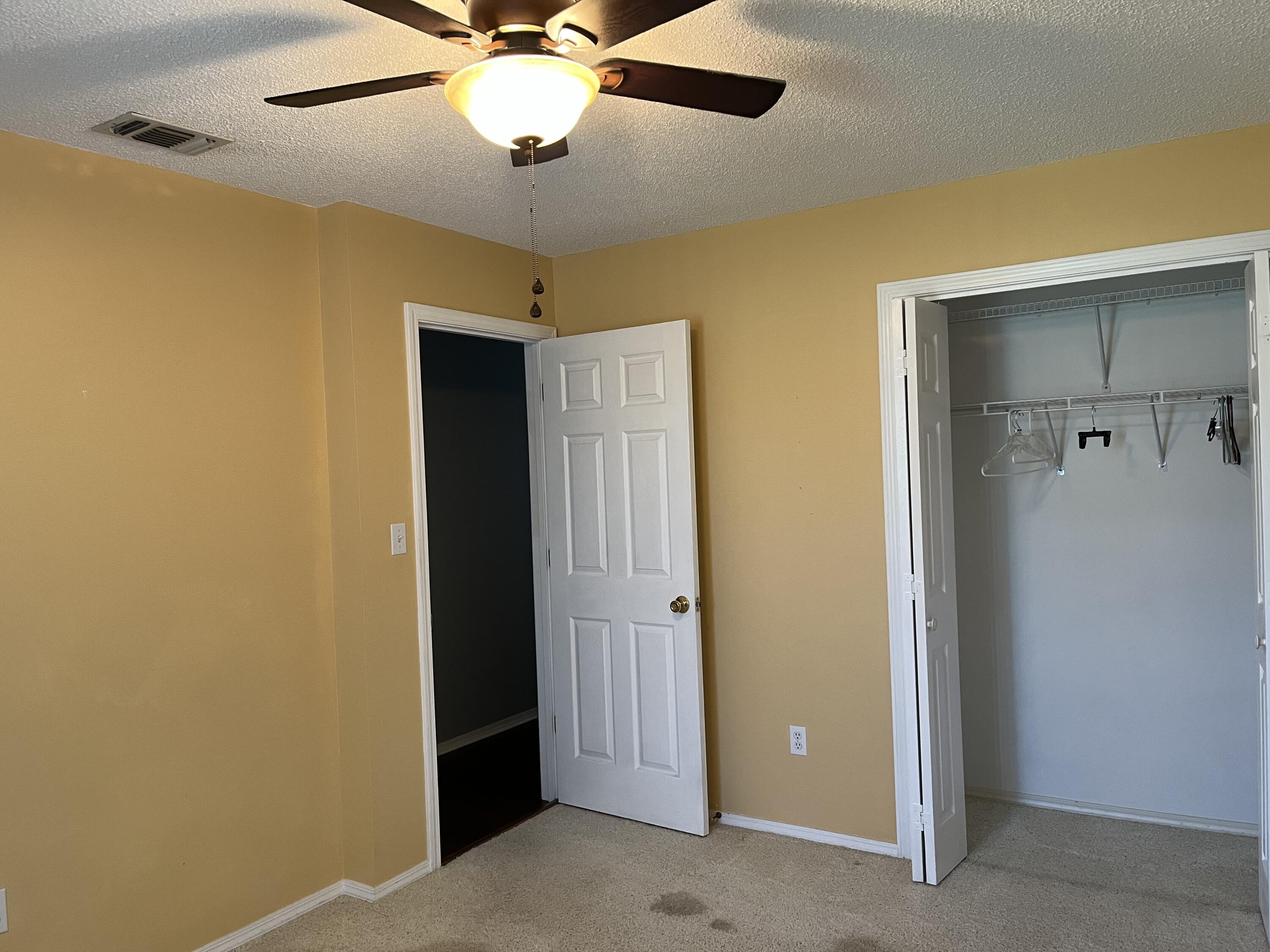 2260 Estate Circle Navarre, FL 32566 - Photo 8 of 14 a view of a livingroom with a chandelier fan