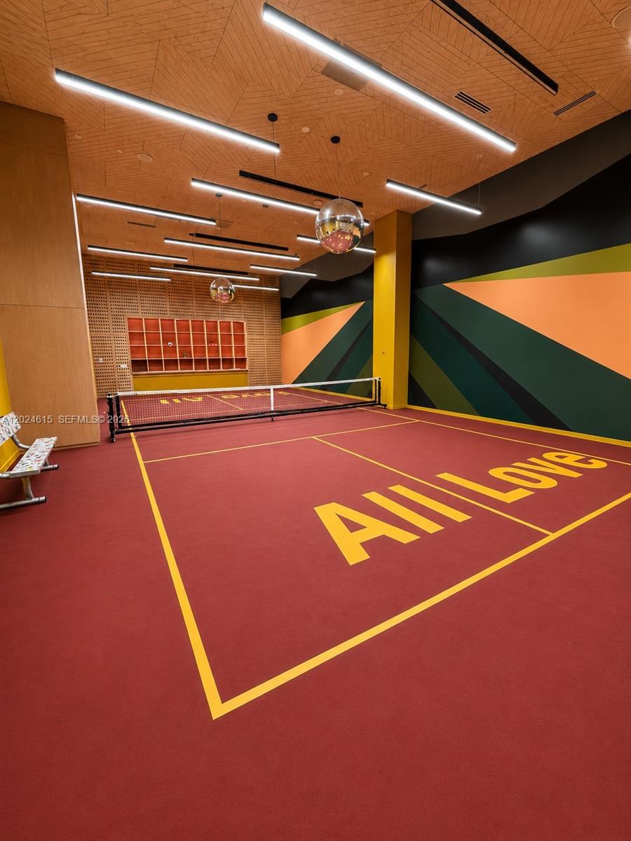 90 Northeast 32nd Street, Unit 301 Miami, FL 33127 - Photo 13 of 21 a view of a indoor basketball court