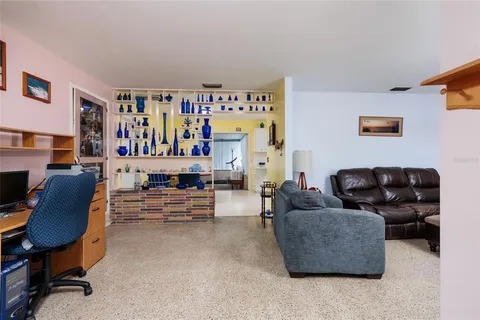 a living room with furniture and a couch