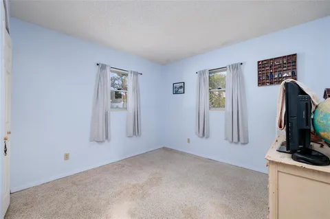 a view of a livingroom with a flat screen tv