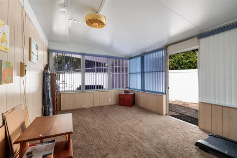 a room with furniture and window