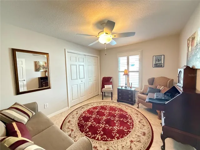 a living room with furniture and a window