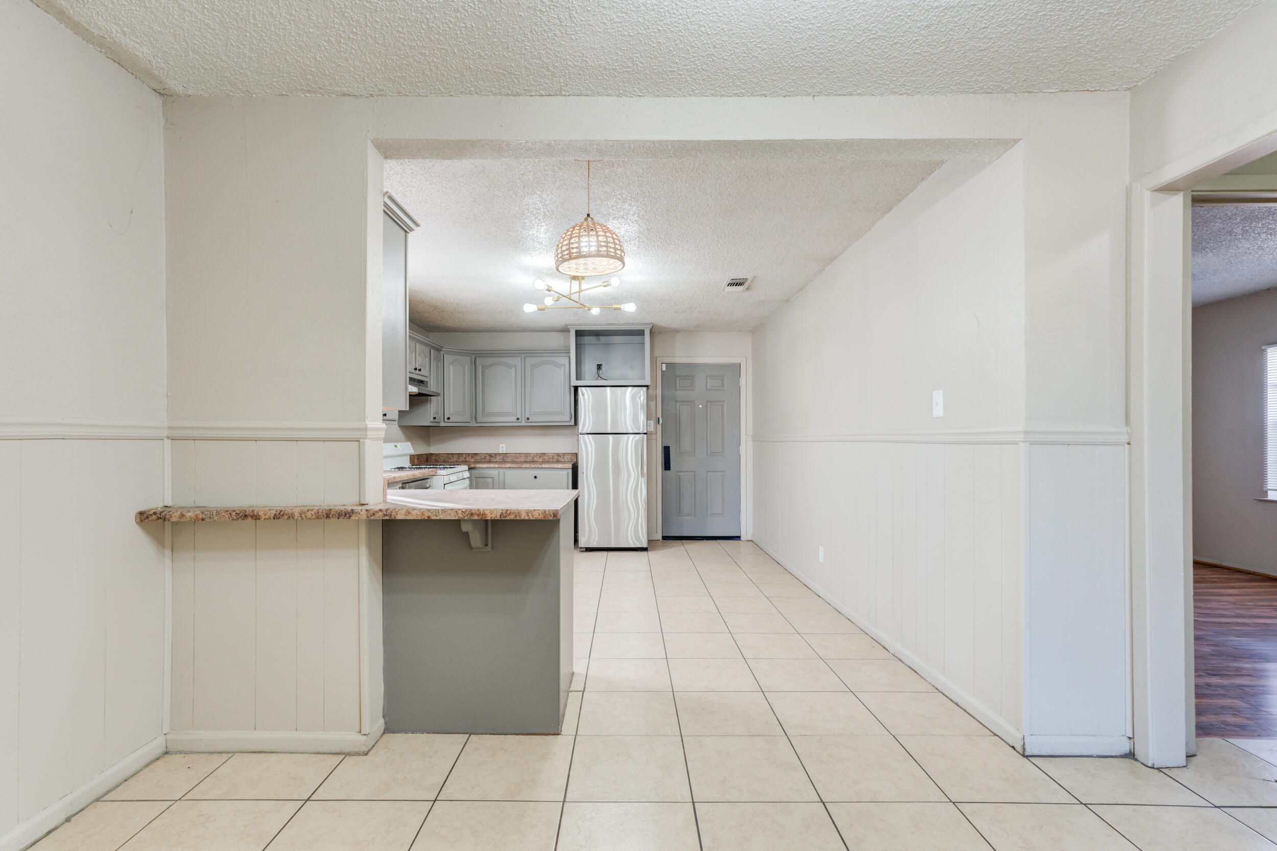 3109 Harvard Street Lubbock, TX 79415 - Photo 13 of 29 a kitchen with a sink and cabinets