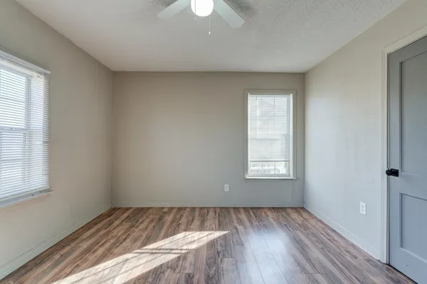 a view of an empty room and window