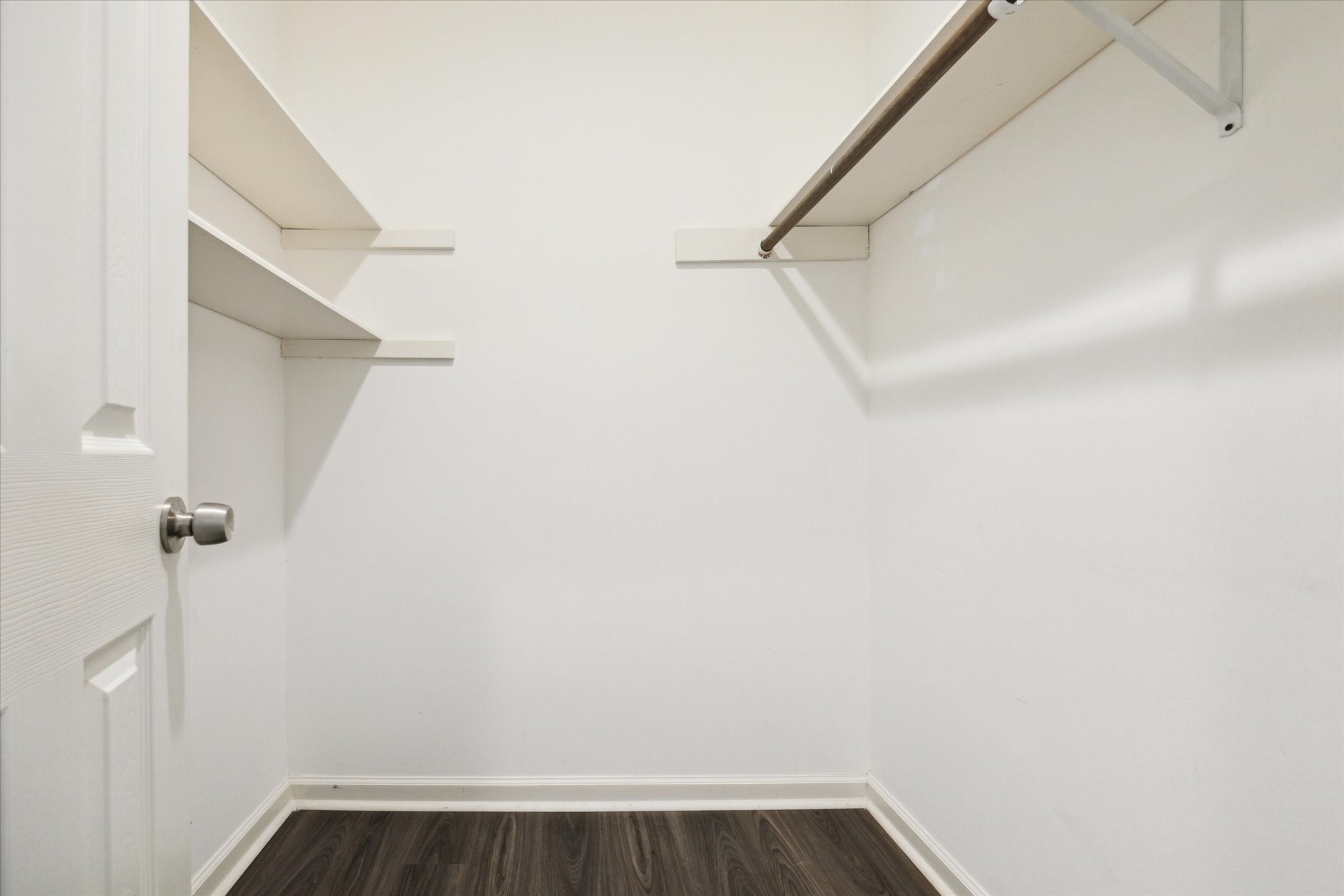 7614 Braesview Lane Houston, TX 77071 - Photo 25 of 29 a view of small space with racks on the wall