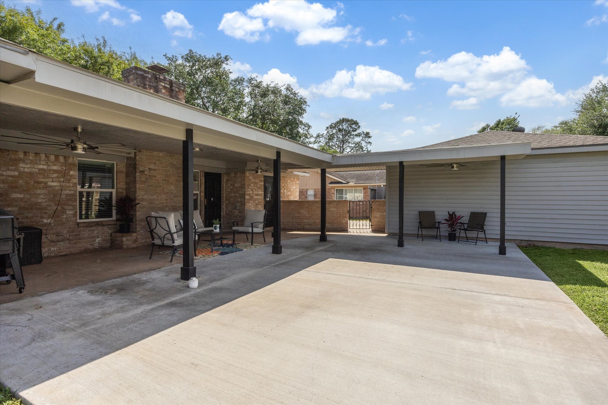 7614 Braesview Lane Houston, TX 77071 - Photo 29 of 29 a view of a chair and tables in patio of the house
