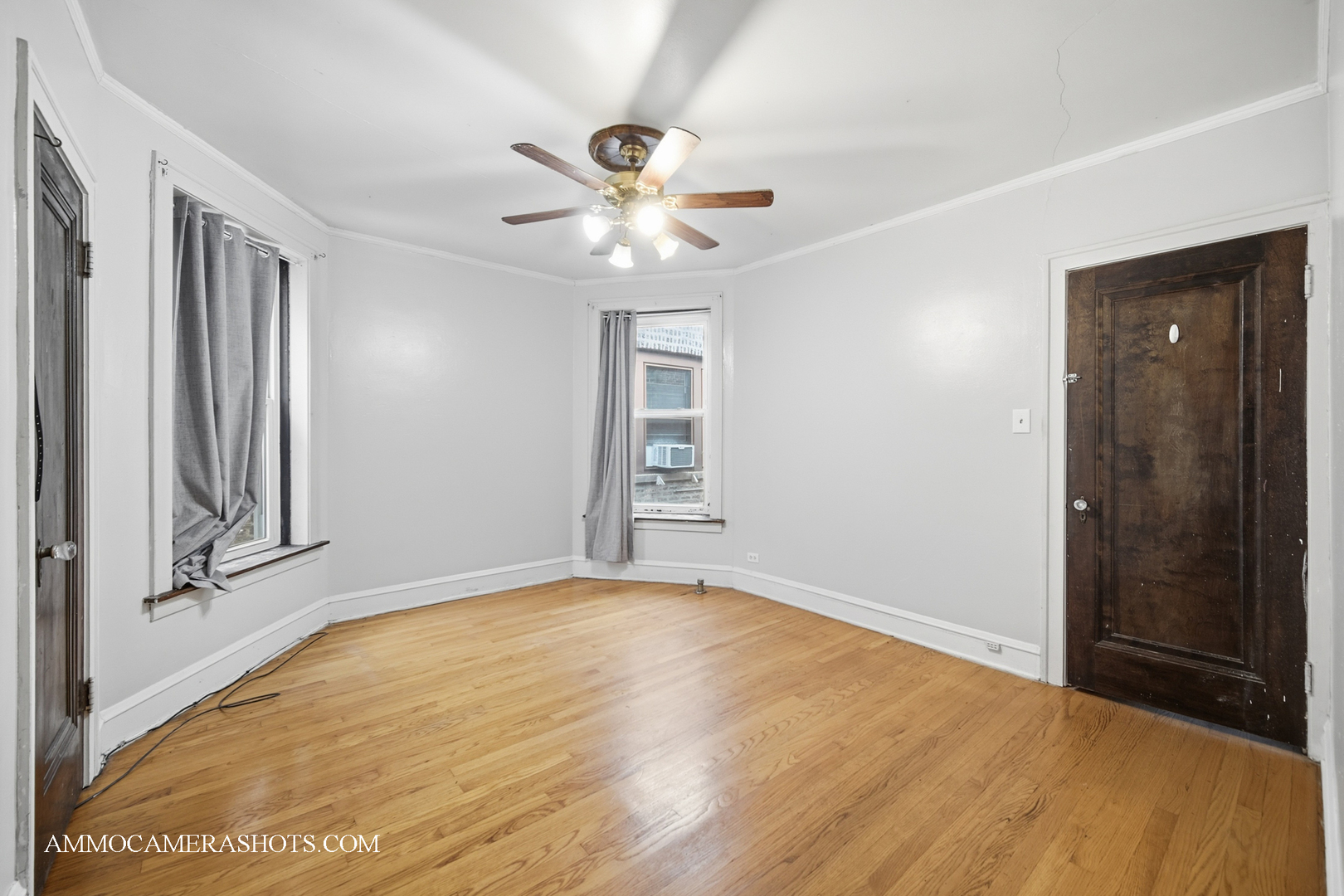 2045 West Farragut Avenue, Unit 3 Chicago, IL 60625 - Photo 23 of 32 a view of an empty room with a window