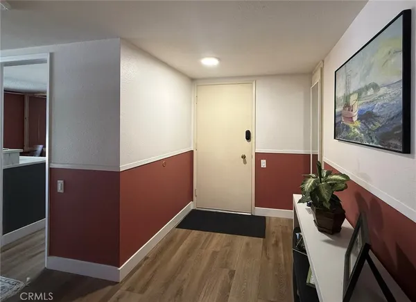 a view of a hallway with workspace