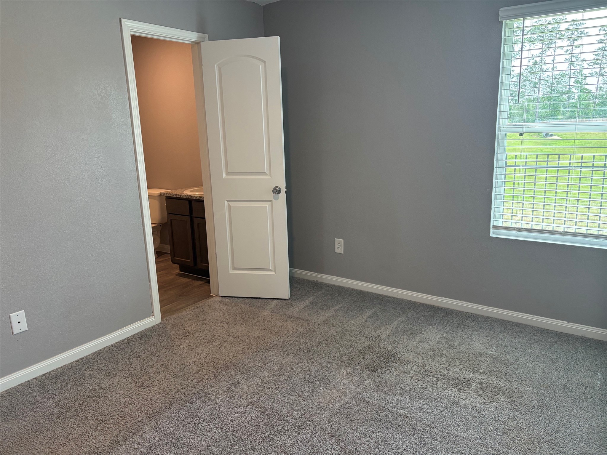 9822 Emerald Stone Way Conroe, TX 77306 - Photo 4 of 12 Master BR with master bath access
