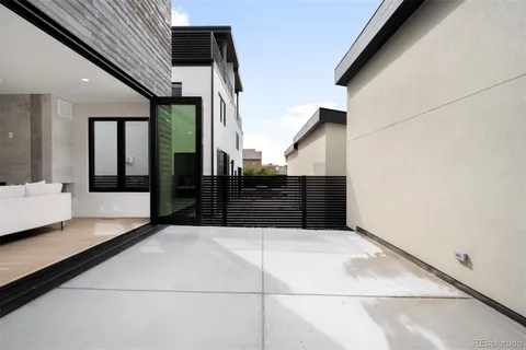 a kitchen with kitchen island sink and faucet