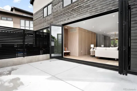 a view of swimming pool with seating space