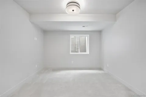 a view of a livingroom with a window