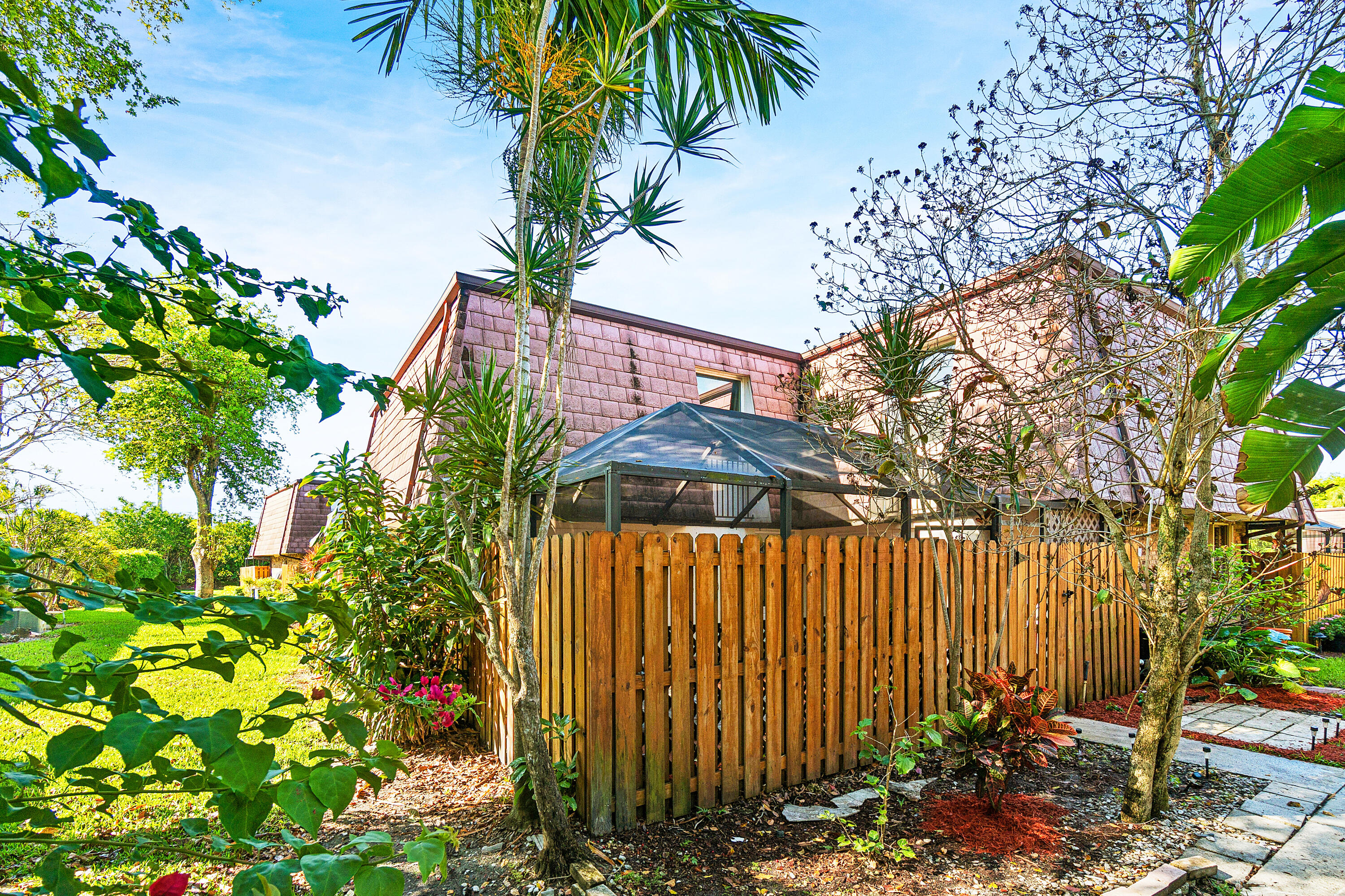 a view of a garden with a pathway