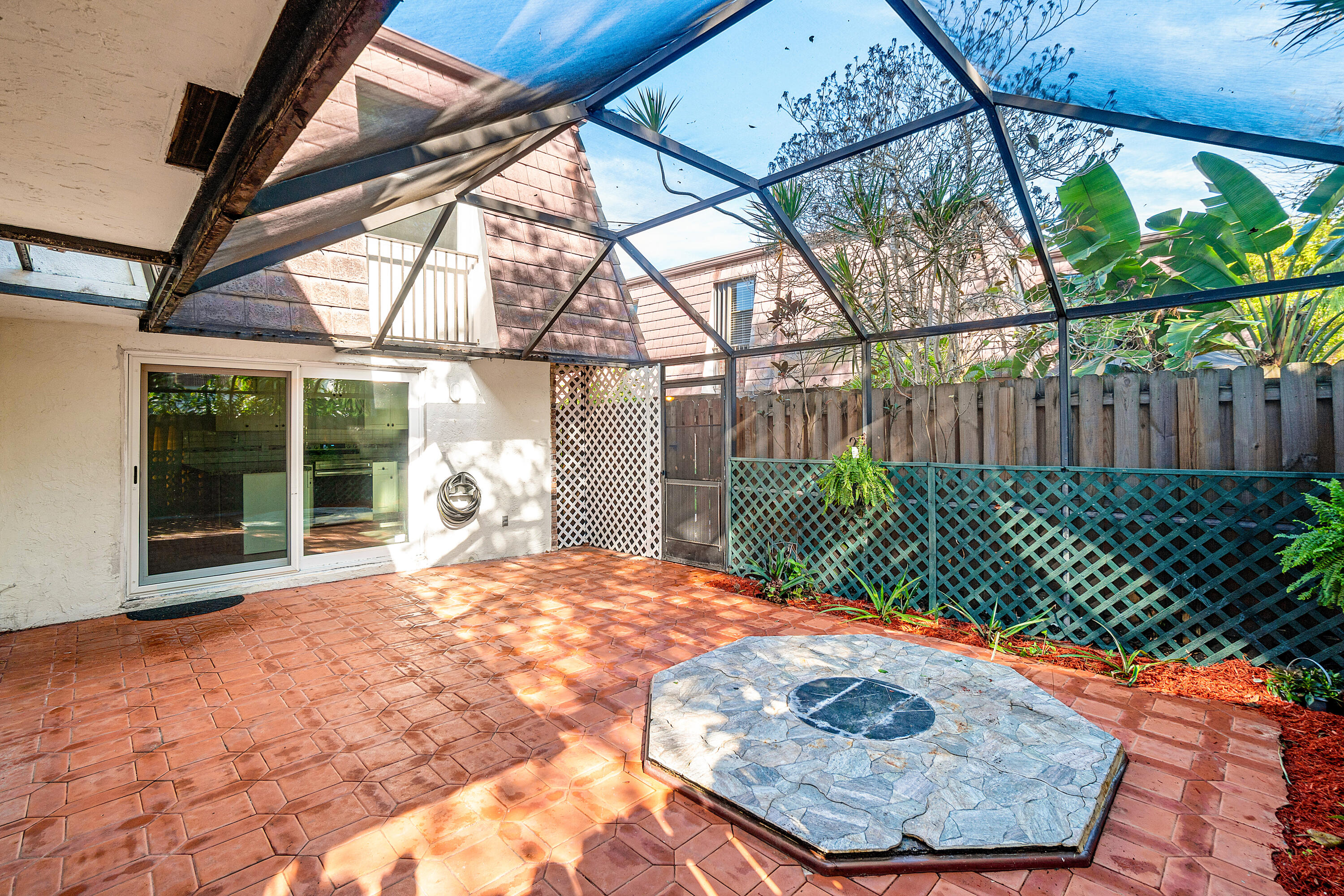 7536 Courtyard Run East Boca Raton, FL 33433 - Photo 12 of 25 a view of a backyard with a small cabin