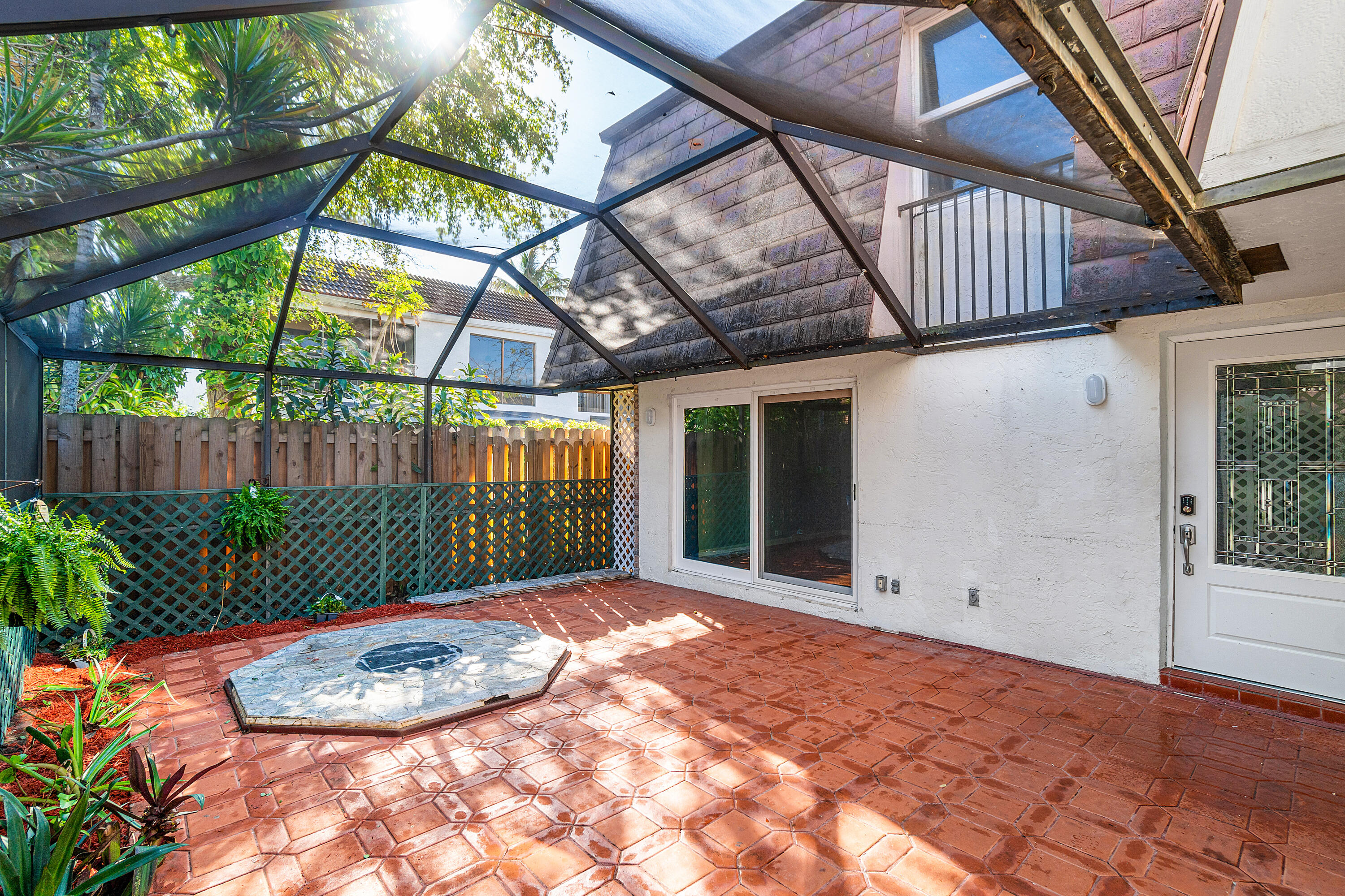 7536 Courtyard Run East Boca Raton, FL 33433 - Photo 2 of 25 a view of a backyard with a small cabin
