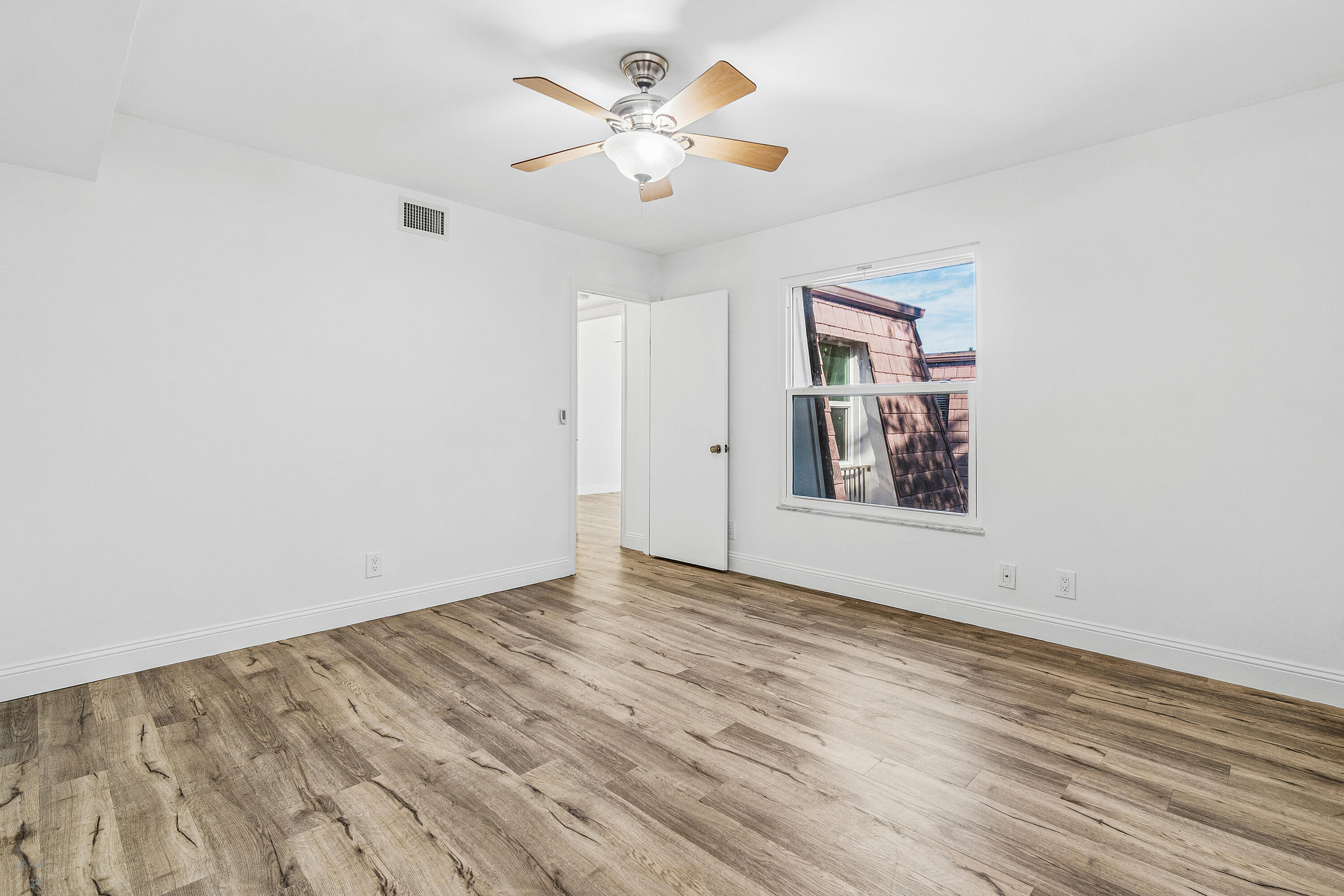 7536 Courtyard Run East Boca Raton, FL 33433 - Photo 23 of 25 wooden floor in a room