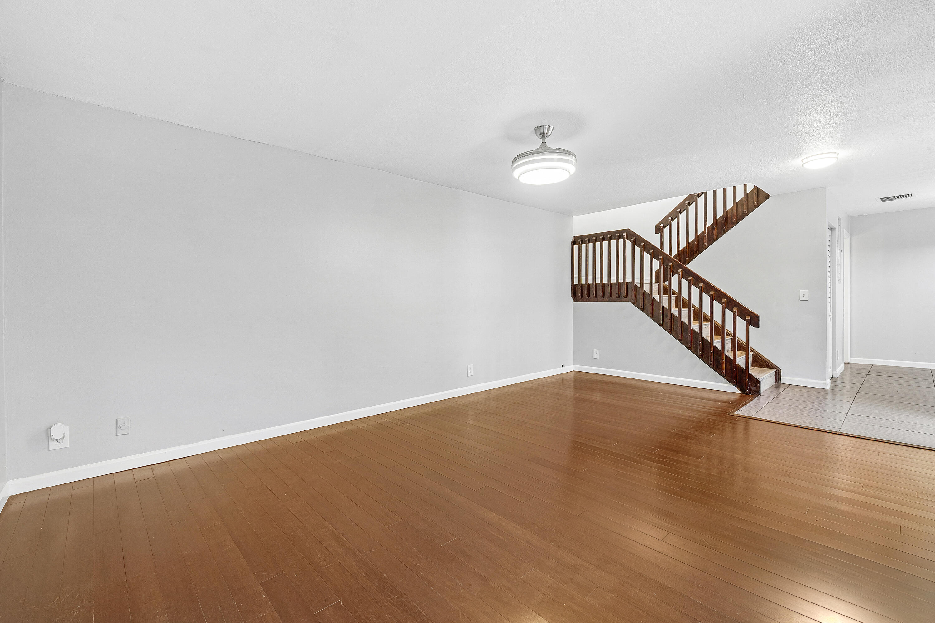 7536 Courtyard Run East Boca Raton, FL 33433 - Photo 4 of 25 a view of an entryway with wooden floor