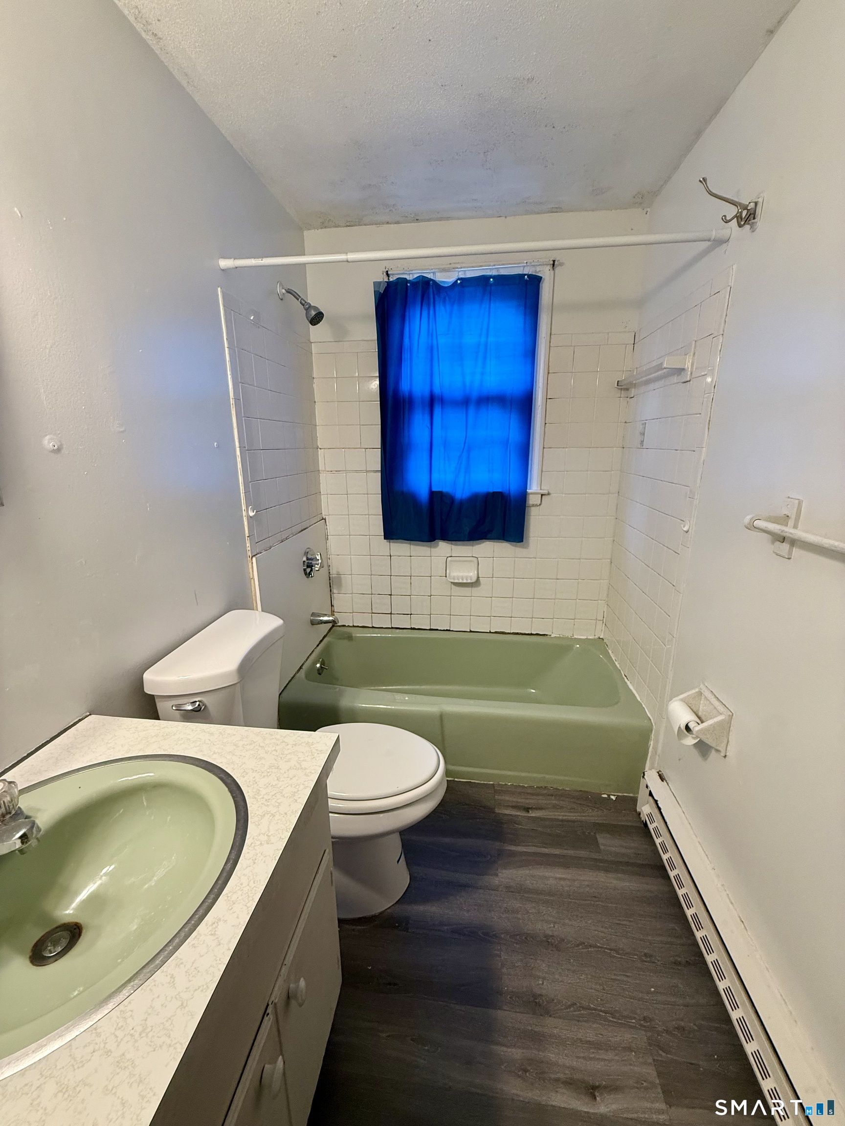 400 Divinity Street Bristol, CT 06010 - Photo 11 of 19 a bathroom with a sink and a mirror