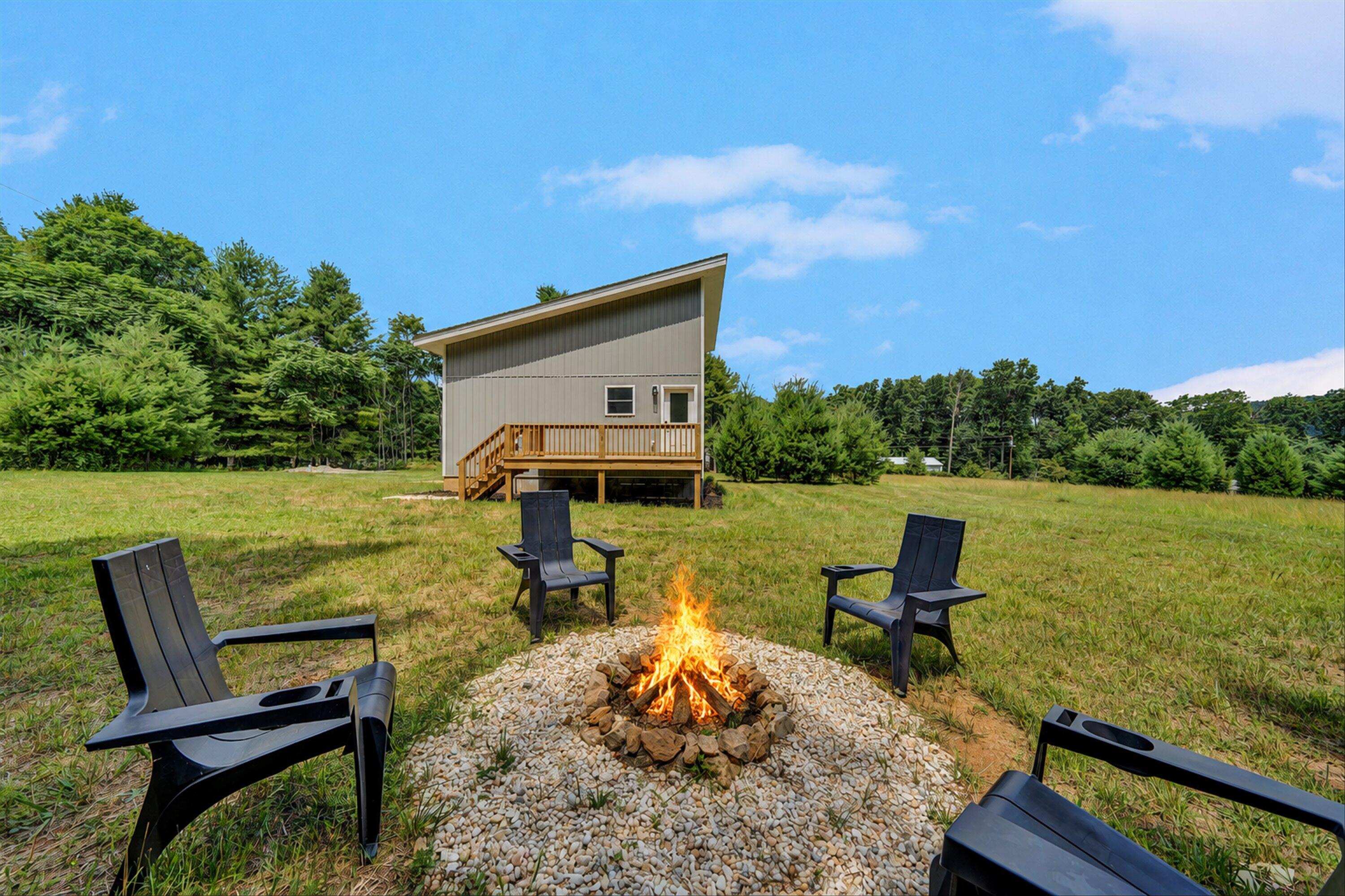 1481 Fairview Church Road Southwest Floyd, VA 24091 - Photo 4 of 33 a view of a chairs and table in the patio
