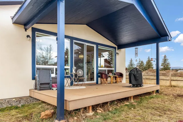 a view of a living room with furniture