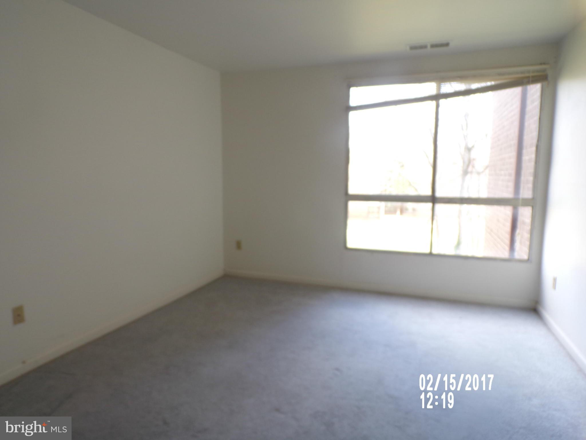 7965 Riggs Road, Unit 6 Hyattsville, MD 20783 - Photo 14 of 20 an empty room with a window