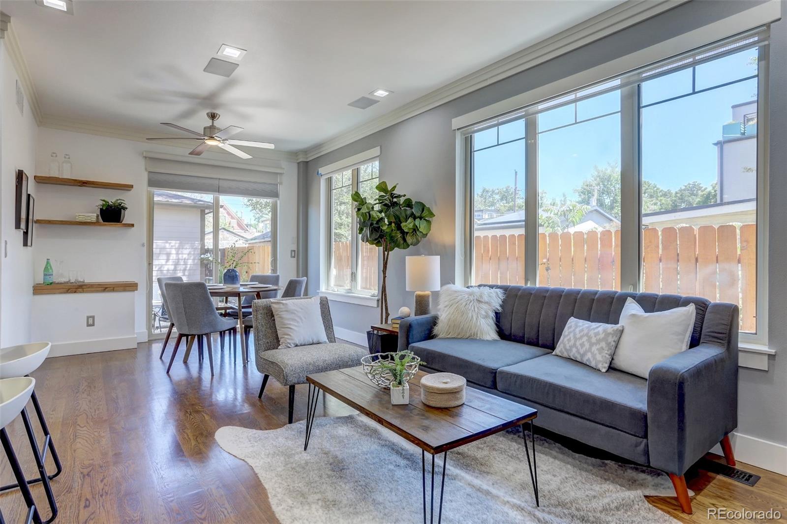 4238 Stuart Street Denver, CO 80212 - Photo 15 of 50 a living room with furniture and a large window