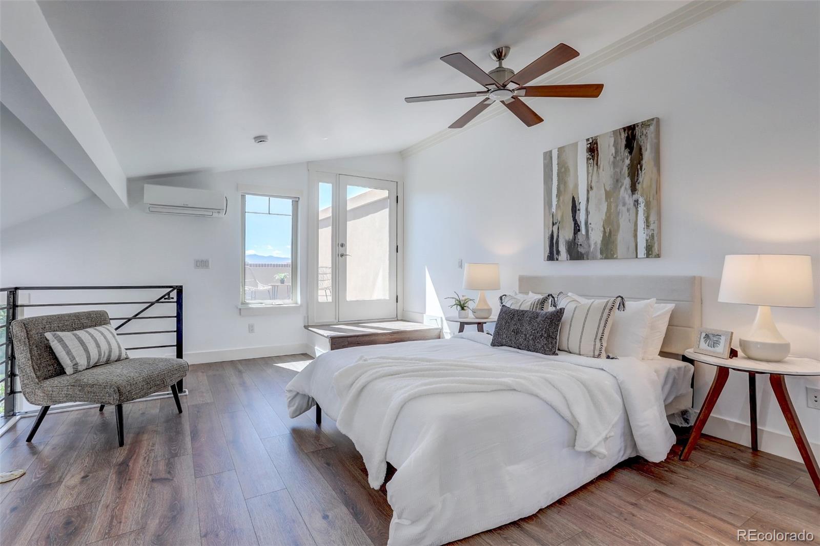 4238 Stuart Street Denver, CO 80212 - Photo 20 of 50 a bedroom with a bed and window