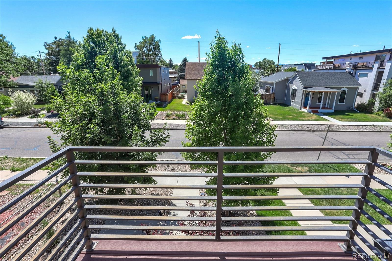 4238 Stuart Street Denver, CO 80212 - Photo 32 of 50 a view of a buildings from a balcony