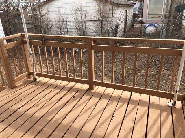1200 Forest Road Colorado Springs, CO 80906 - Photo 35 of 40 Wood Deck, Accomadates Plenty Of Outdoor Furniture
