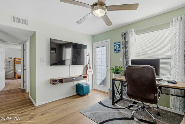 a room with a bed and a window