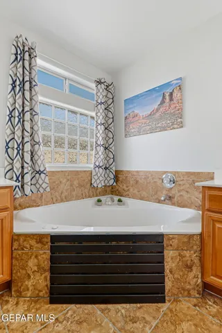 a view of a livingroom with furniture and cabinet