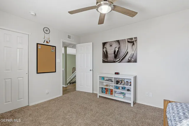 a front view of a house with garden and porch