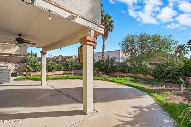an aerial view of a house with swimming pool