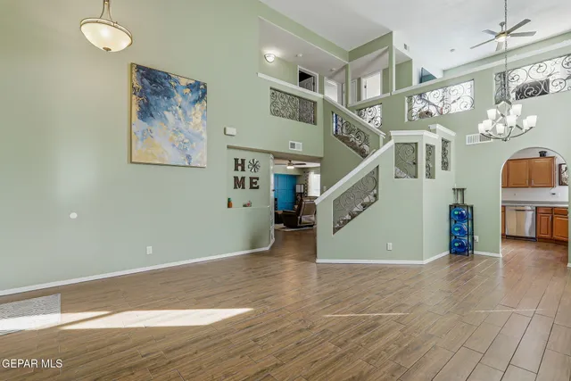 a view of an entryway with wooden floor