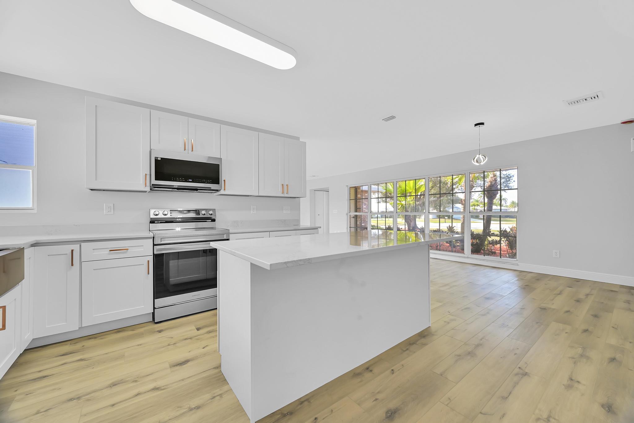 1704 Southeast Adair Road Port St. Lucie, FL 34952 - Photo 23 of 54 Kitchen