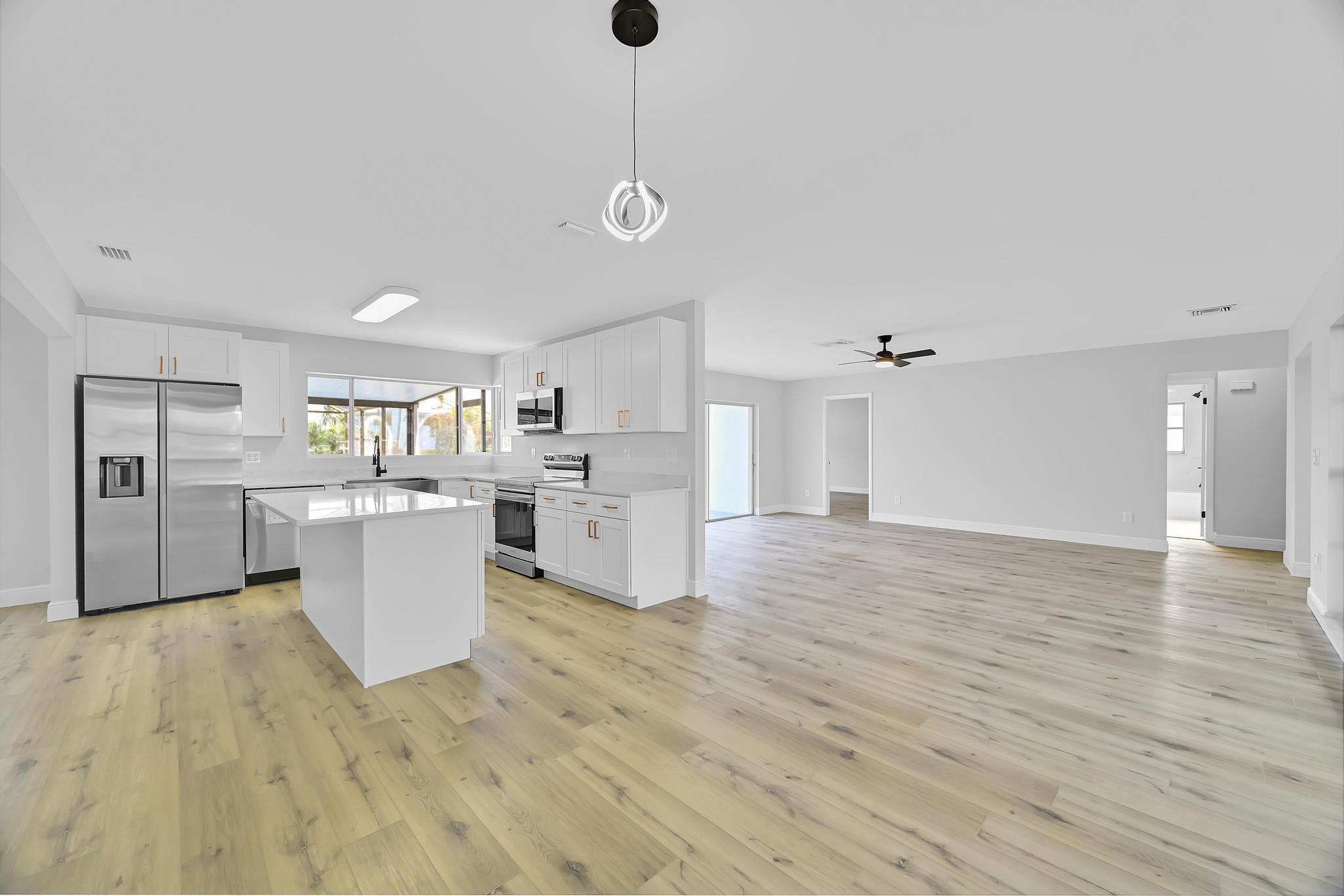 1704 Southeast Adair Road Port St. Lucie, FL 34952 - Photo 29 of 54 Kitchen/Living