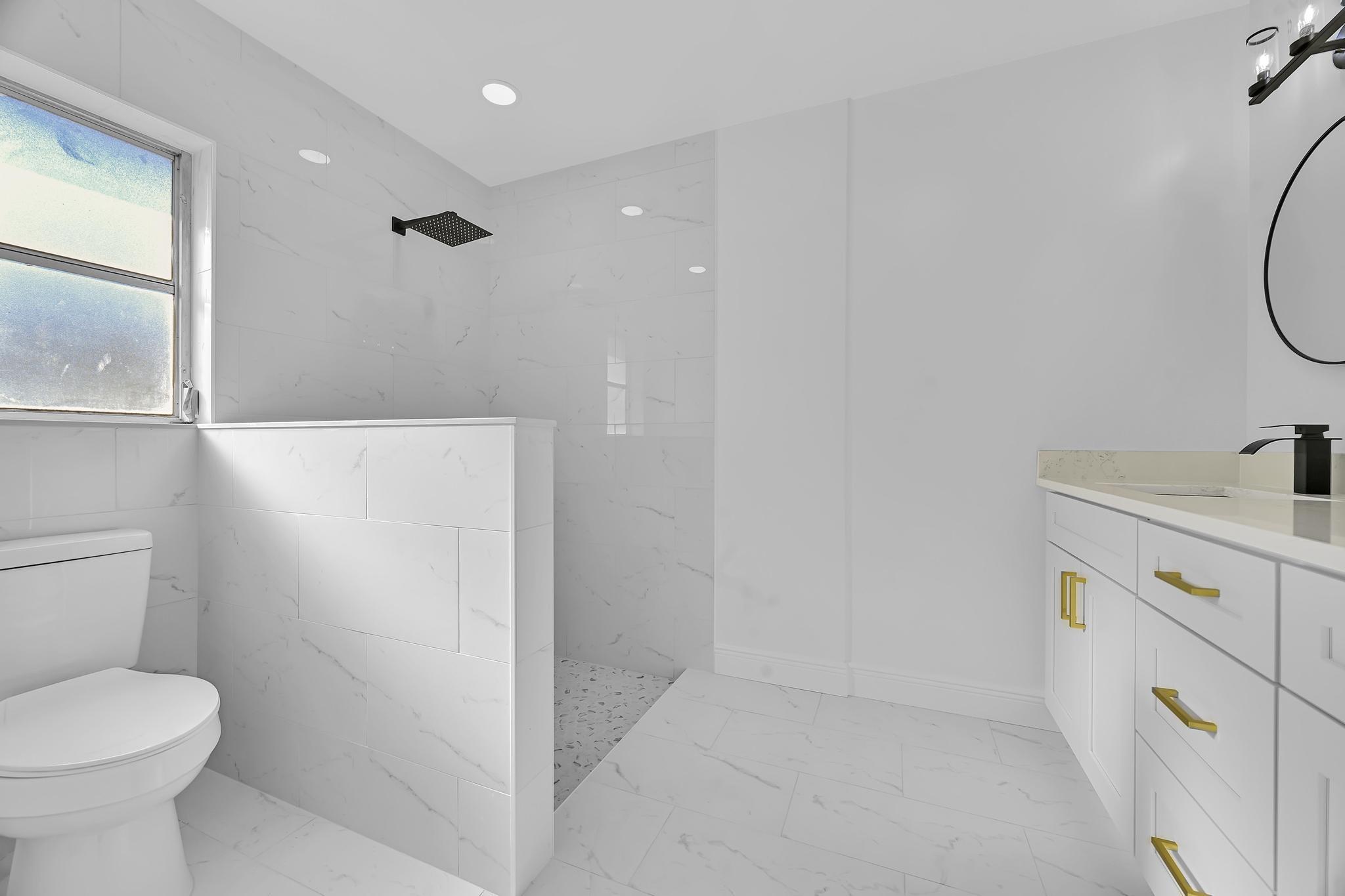 1704 Southeast Adair Road Port St. Lucie, FL 34952 - Photo 40 of 54 Bathroom