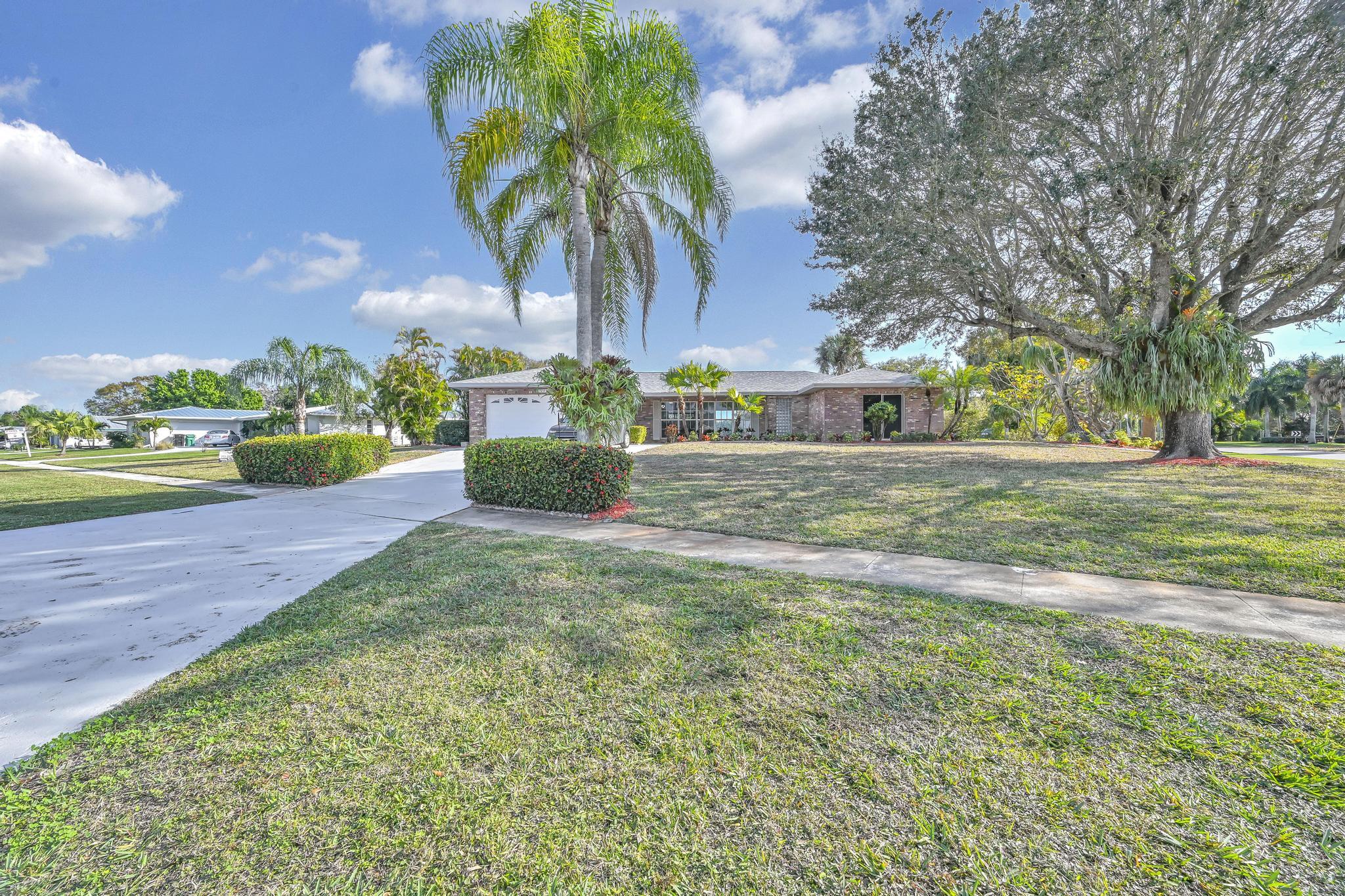 1704 Southeast Adair Road Port St. Lucie, FL 34952 - Photo 4 of 54 Front