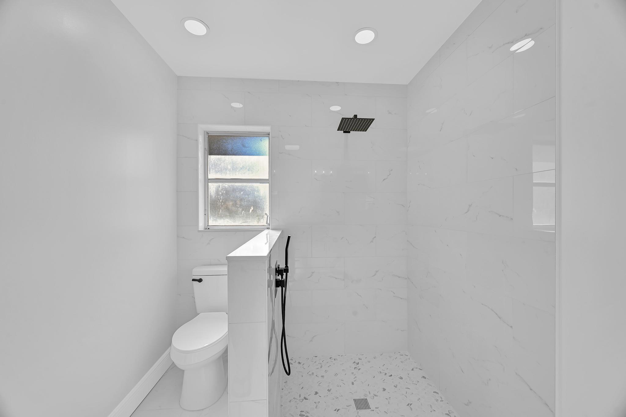 1704 Southeast Adair Road Port St. Lucie, FL 34952 - Photo 42 of 54 Bathroom