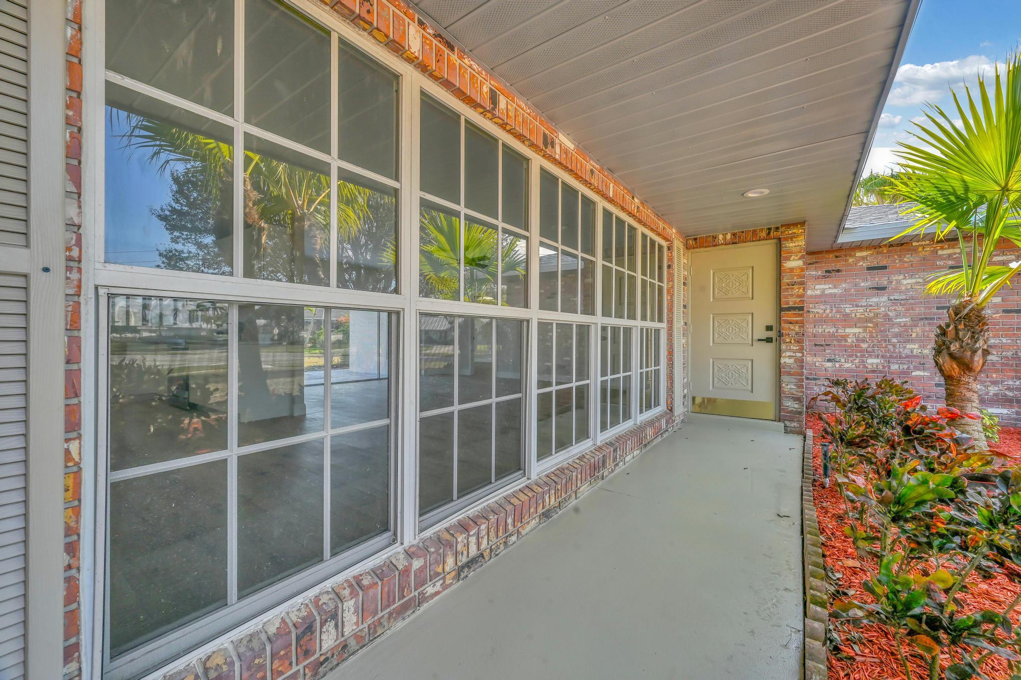 1704 Southeast Adair Road Port St. Lucie, FL 34952 - Photo 5 of 54 Porch