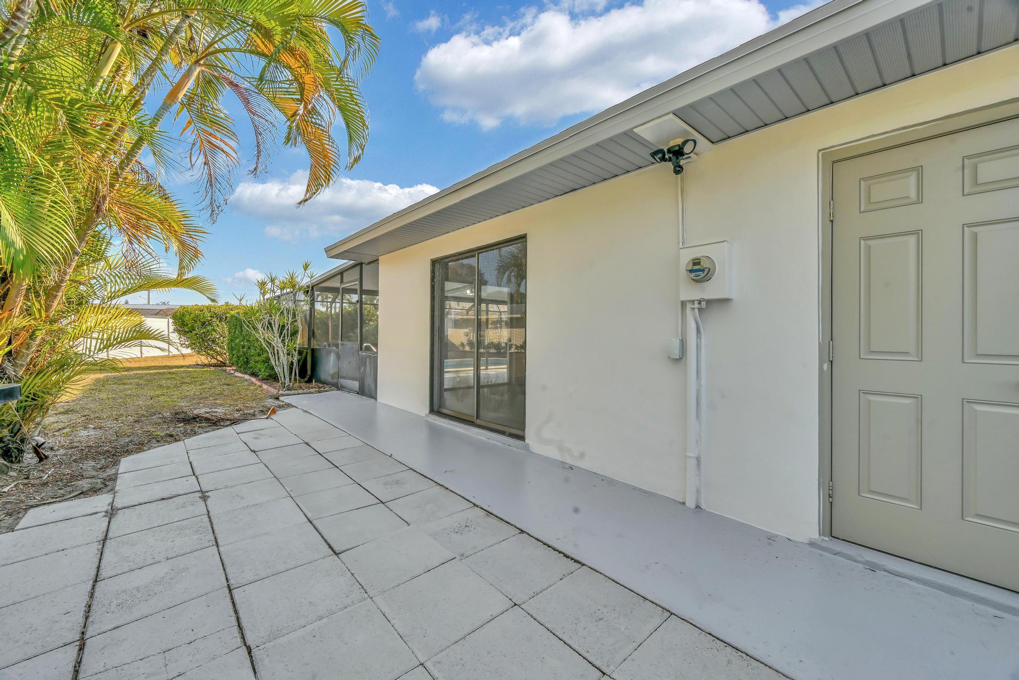 1704 Southeast Adair Road Port St. Lucie, FL 34952 - Photo 54 of 54 Rear