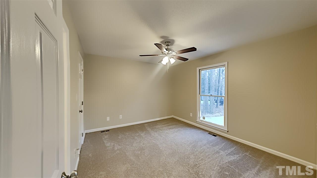 4225 Labrador Drive Raleigh, NC 27616 - Photo 7 of 13 a view of an empty room with a window