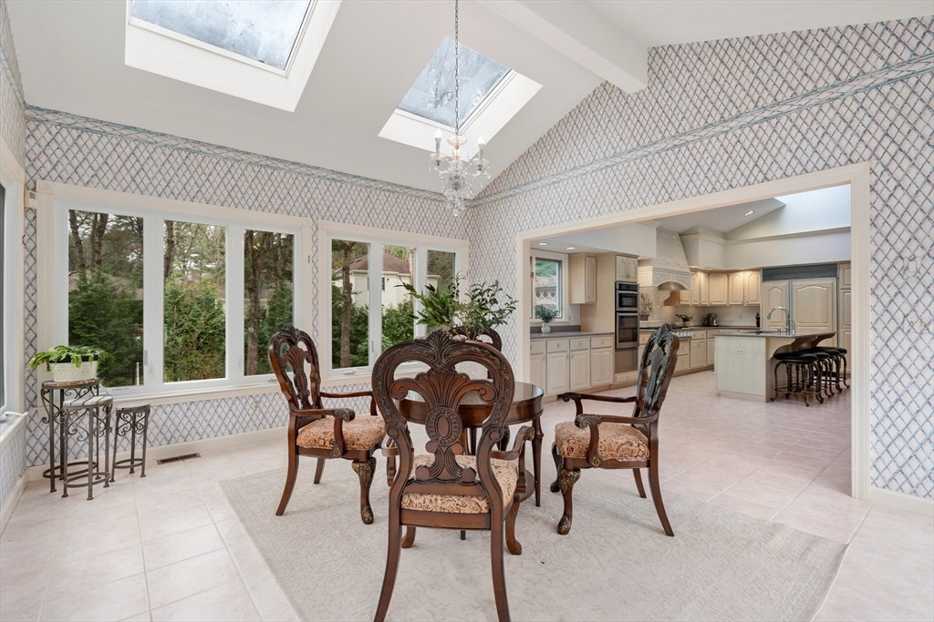 67 Bridle Path Sudbury, MA 01776 - Photo 17 of 42 a view of a dining room with furniture window and outside view