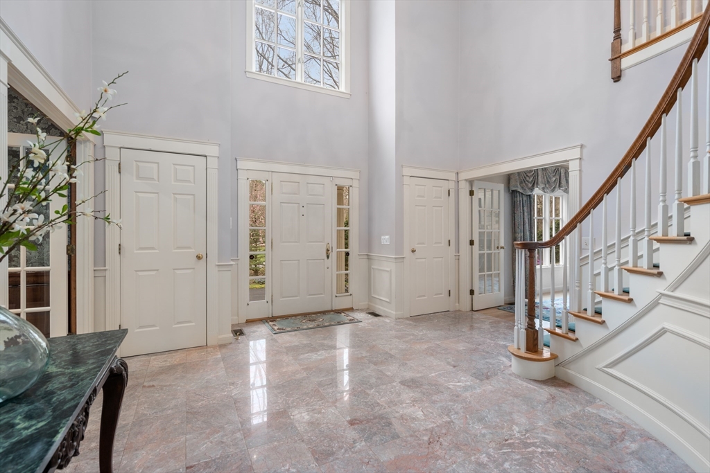 67 Bridle Path Sudbury, MA 01776 - Photo 3 of 42 a view of an empty room with stairs