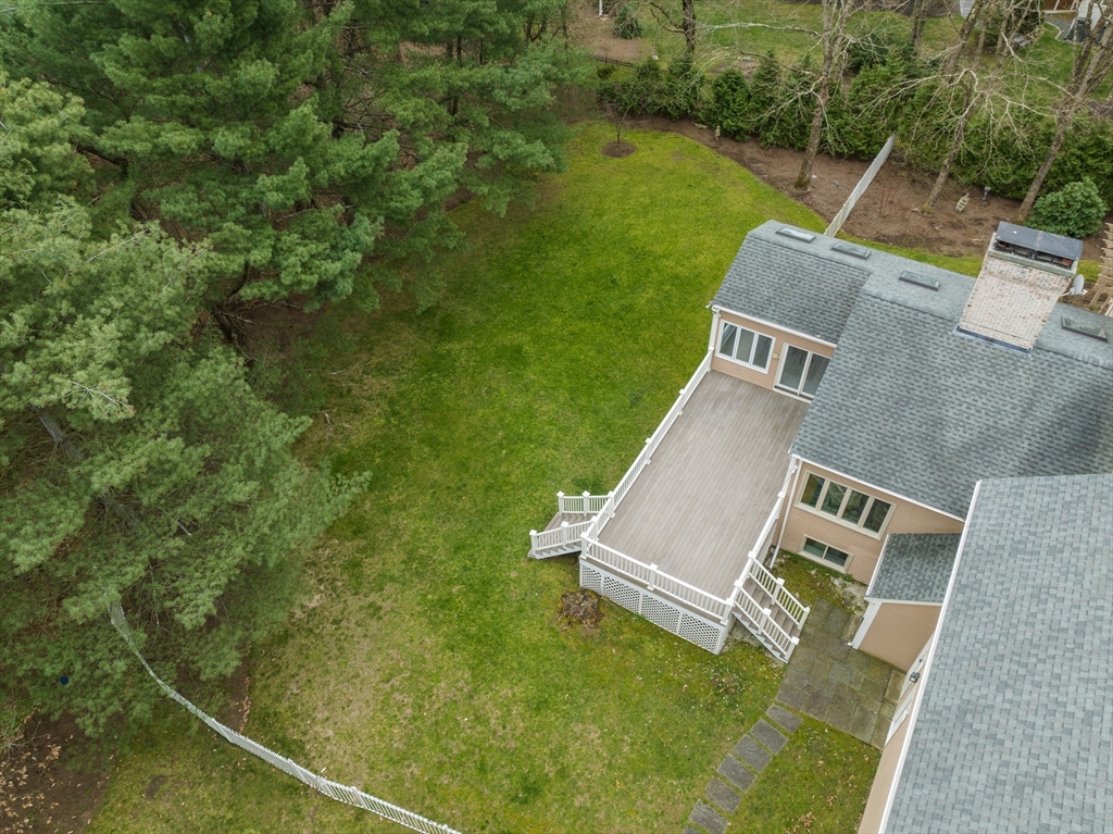 67 Bridle Path Sudbury, MA 01776 - Photo 34 of 42 an aerial view of a house with a garden and lake view