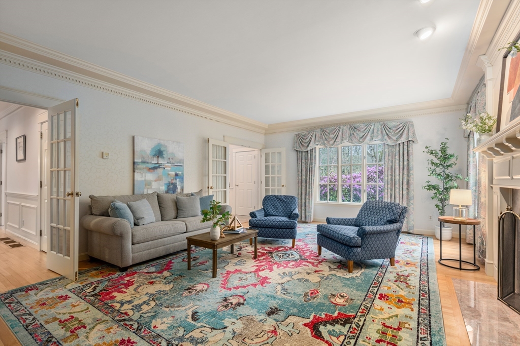 67 Bridle Path Sudbury, MA 01776 - Photo 8 of 42 a living room with furniture and a rug