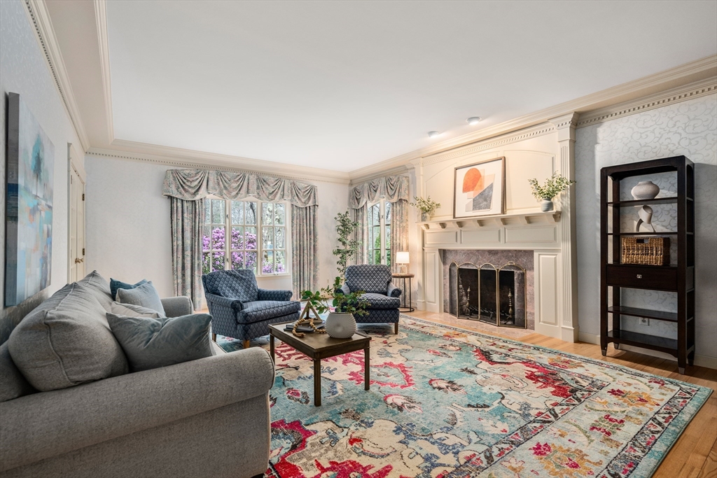 67 Bridle Path Sudbury, MA 01776 - Photo 9 of 42 a living room with furniture and a fireplace