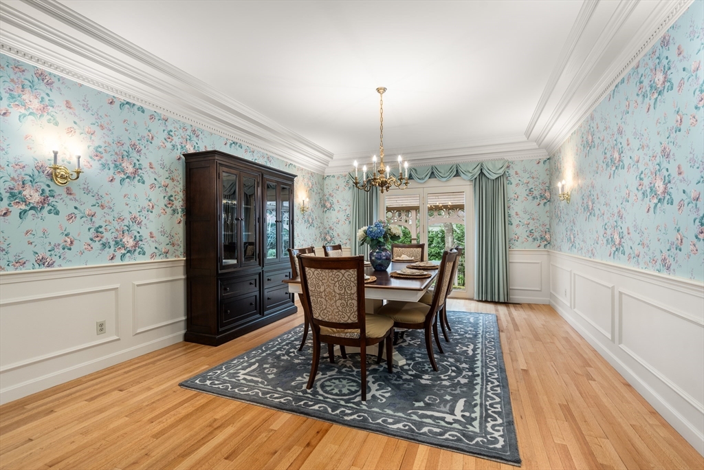 67 Bridle Path Sudbury, MA 01776 - Photo 10 of 42 a view of a dining room with furniture window and wooden floor
